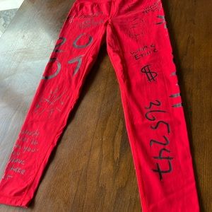 HTFU women’s size M high-rise leggings. Bright red color with black words.
